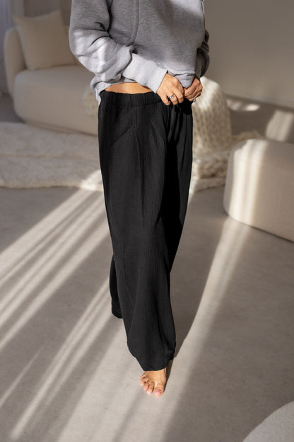 damske-balonove- kalhoty- z- lehkeho- muselinu-vzdusne -elegantni-do-mesta-na-vikend- Lezerni-Elastický-malinko-snizeny-cerna