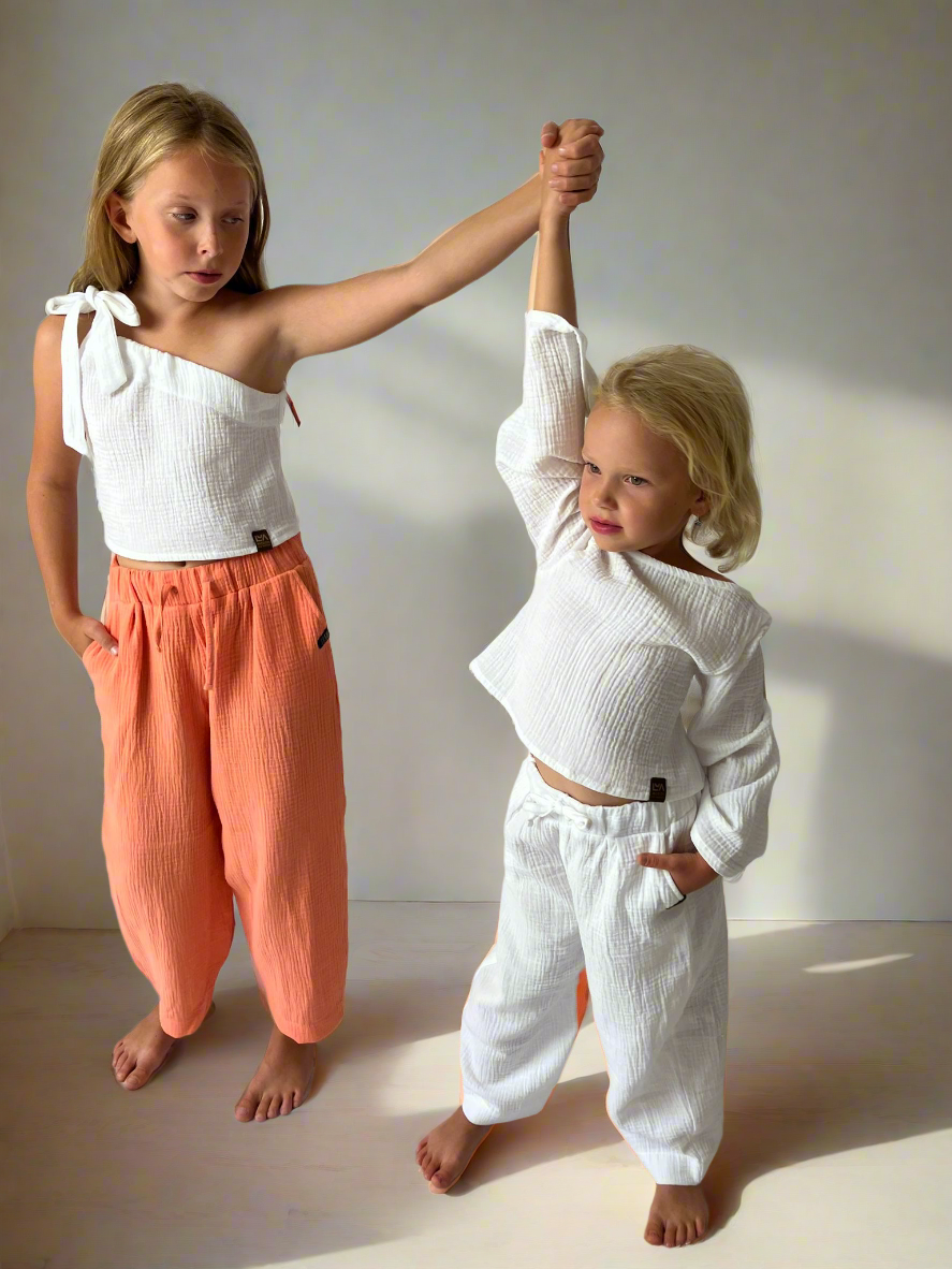 divci-kalhoty-lezerni-vzhled-elasticky-pas-jemny-prodysny-vzdusne-coral